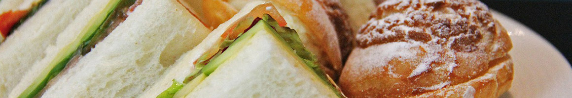 Eating Sandwich at Bagel Me! restaurant in Villa Park, CA.